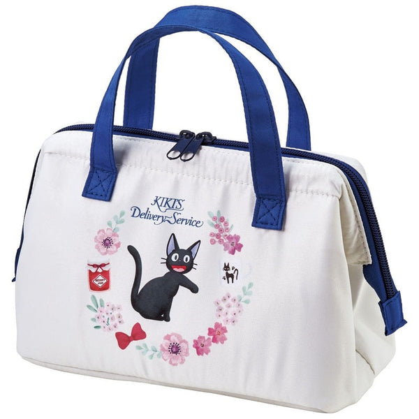 White bag with blue handles featuring Kiki's Delivery Service design on a white background